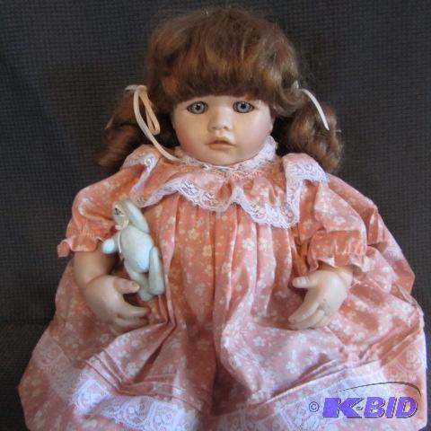 lot 221 image: Porcelain Doll by Pauline