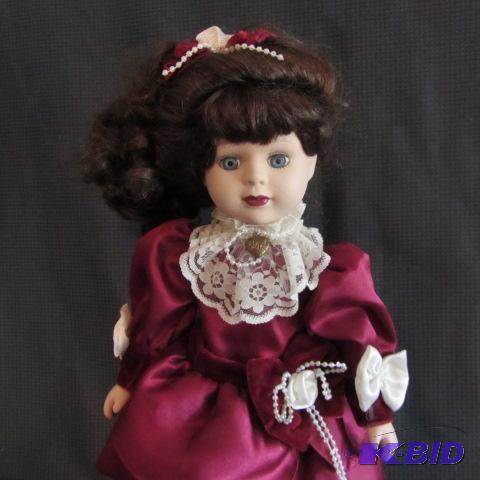 lot 233 image: Fancy Dress Porcelain Doll