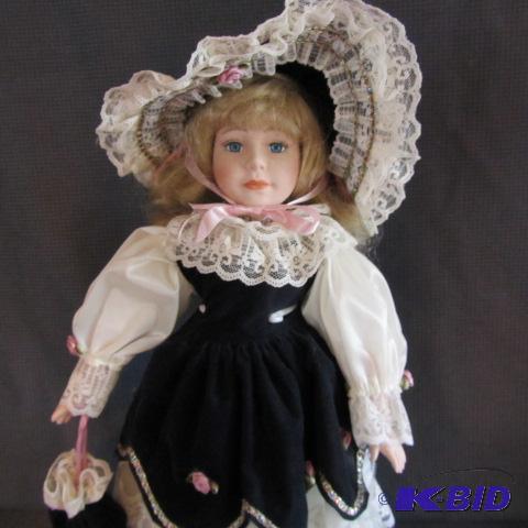 lot 254 image: Porcelain Doll with Fancy Hat