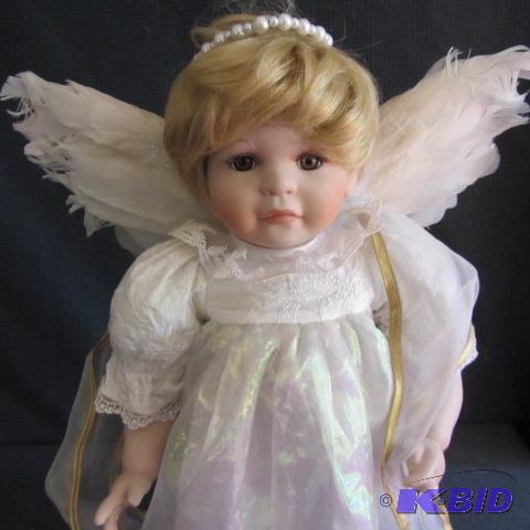 lot 28 image: Chubby Angel Doll