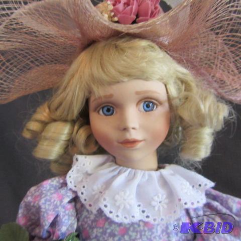 lot 57 image: Porcelain Doll