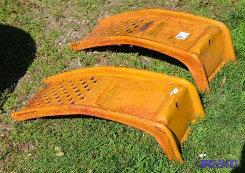 lot 76 image: 76- 2 yellow car ramps Max tire width 9"...