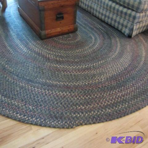 lot 35 image: Oval Braided Rug