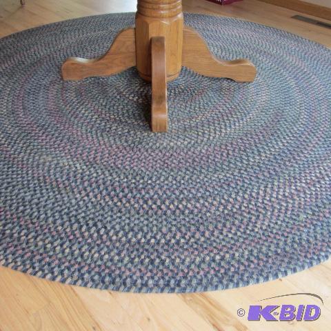 lot 36 image: Oval Braided Rugs