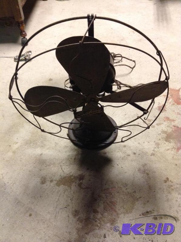 lot 39 image: Very Old Fan with Heavy Base