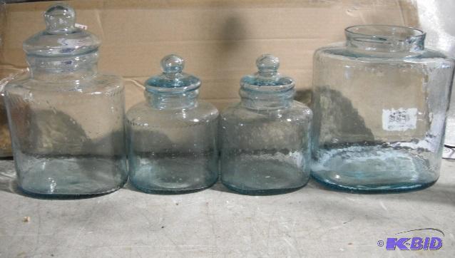 Four Glass Jar Set - The largest jar is missi...