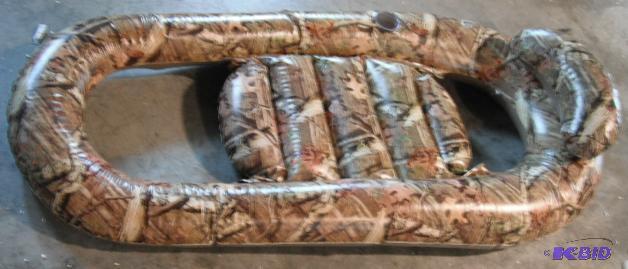 lot 66 image: Camoflauge Floatation Device - Has a hole - n...