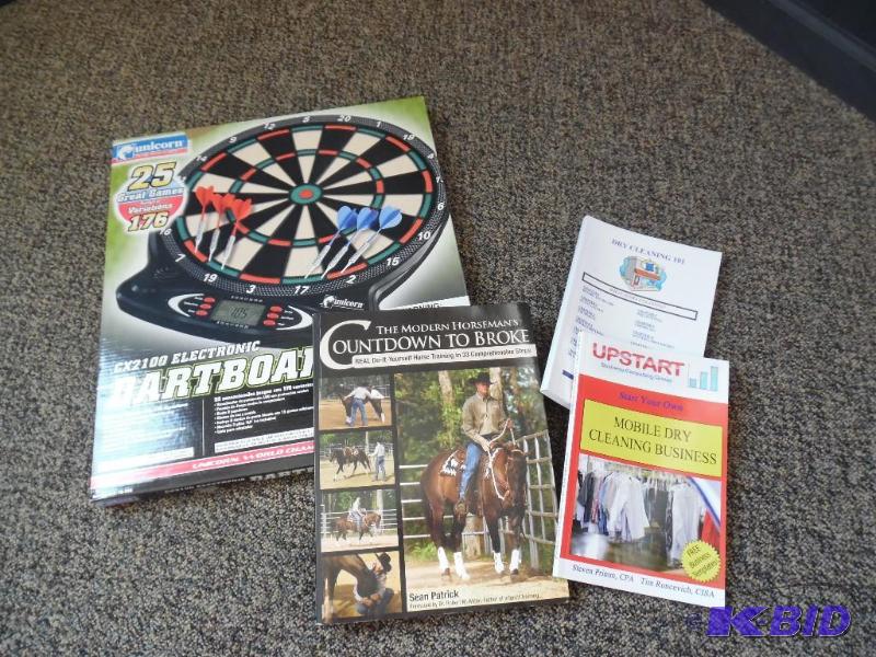 Dartboard and book