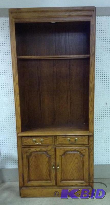 lot 23 image: Hooker Furniture Lighted Display Case with Storage