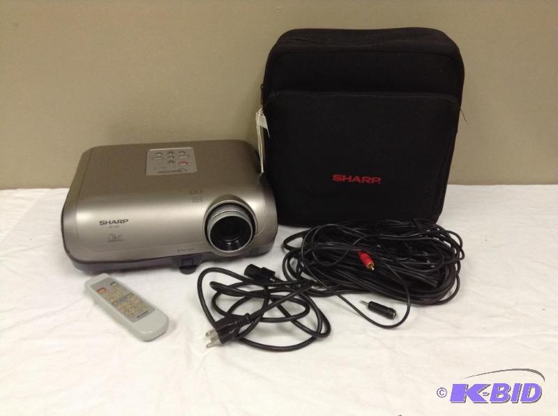 lot 9 image: Sharp Projector Model XR-11XC with Remote