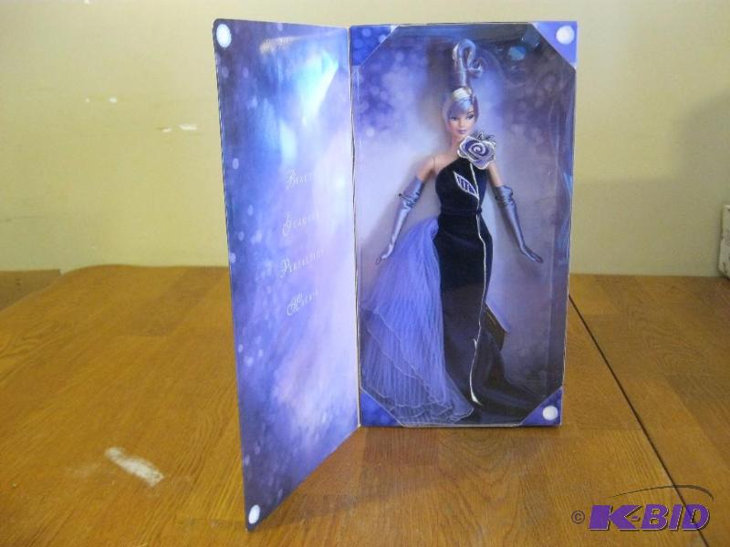 lot 101 image: The Sterling Silver Rose Collectable Barbie B...