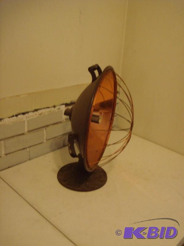 lot 18 image: Vintage Antique Copper Heater With Ornate Cas...