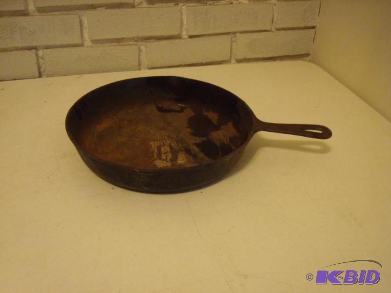 lot 204 image: Cast Iron Pan...