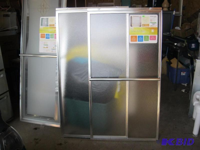 lot 320 image: New ShowerBath Door. No RailsHardware. Reta...