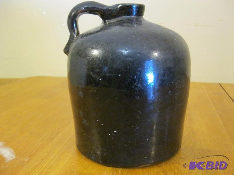 lot 39 image: Vintage Antique Moonshine Jug. ...