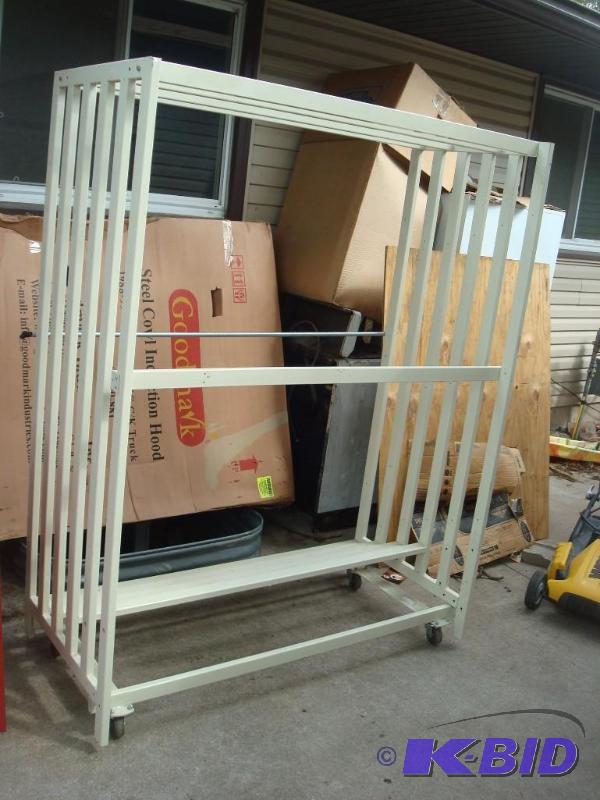 lot 66 image: Large Metal Commercial&nbspRack On Caster Wh...