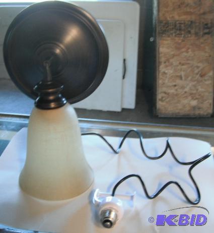lot 26 image: Wall Sconce Light - Golden frosted globe with...
