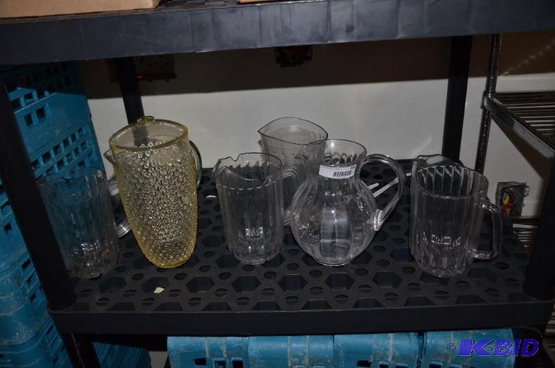 lot 202 image: Lot of six plastic pitchers...
