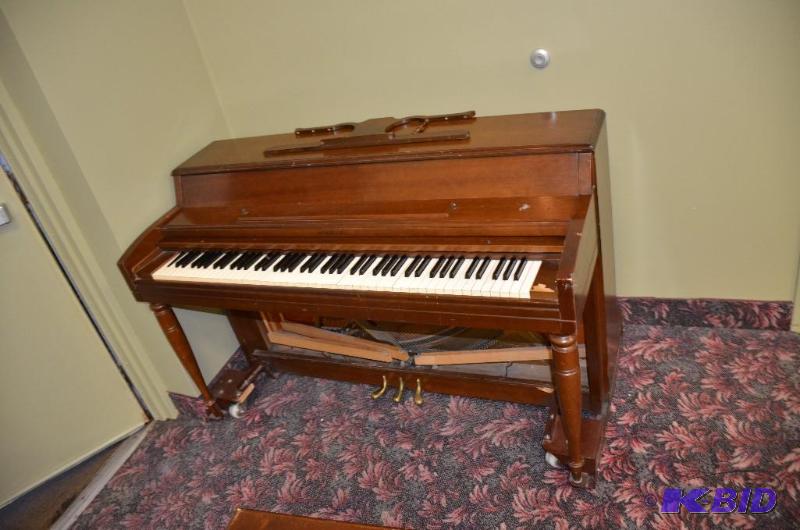 lot 365 image: Piano on two piano movers Please bring your o...
