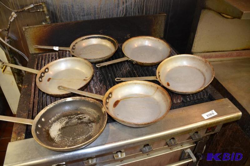 lot 76 image: 6 heavy duty skillets....