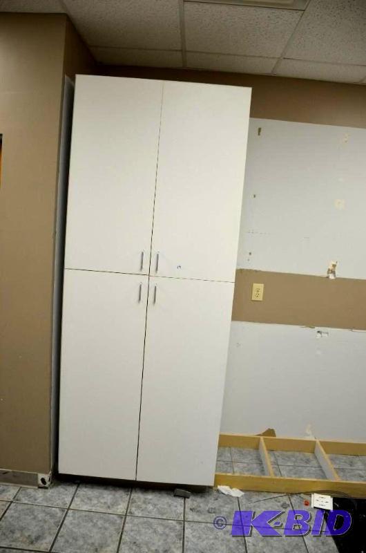 4 door white cabinet. 27 14&quotx38&quotx9...