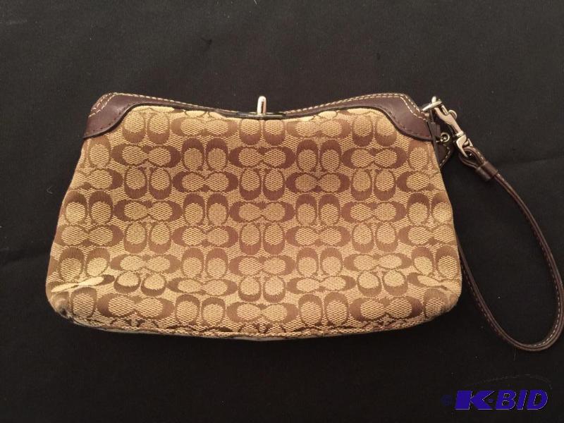 lot 85 image: Authentic Coach Wristlet