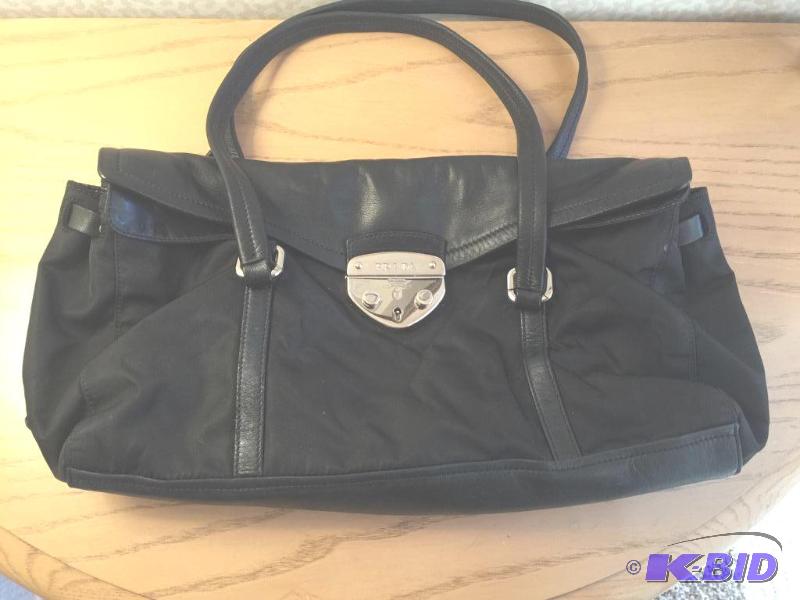 lot 92 image: Authentic PRADA Leather & Nylon Handbag.