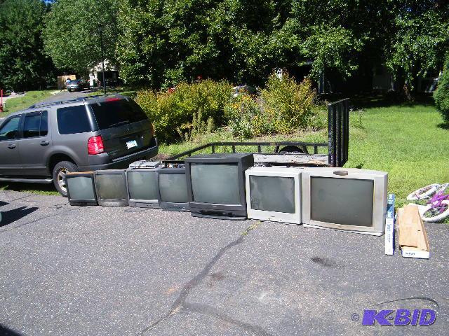 lot 11 image: Lot of 7 TVs and 1 DVD Player - Five of the T...