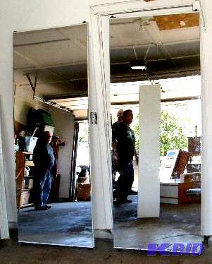 lot 19 image: Pair of Mirrored Closet Doors - 30" w x ...