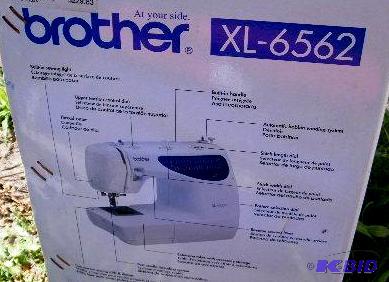 lot 31 image: Brother Electric Sewing Machine - Model XL656...