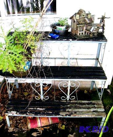 lot 51 image: Three Tier Outdoor Metal and Wood Plant Stand...