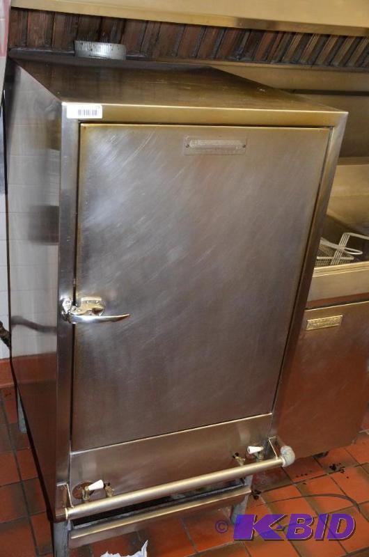 lot 19 image: Frank H. Yick and Co. Smoker 26x30x54. Please...