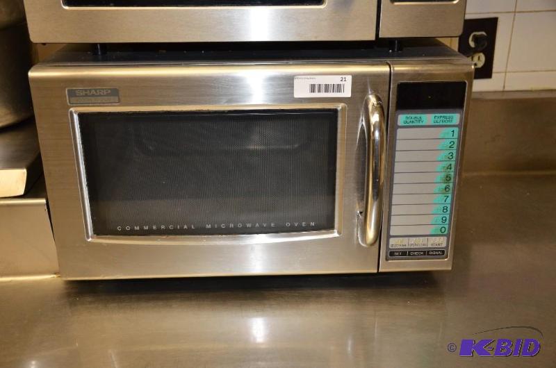 lot 21 image: SHARP Commercial microwave oven model R-21JV....