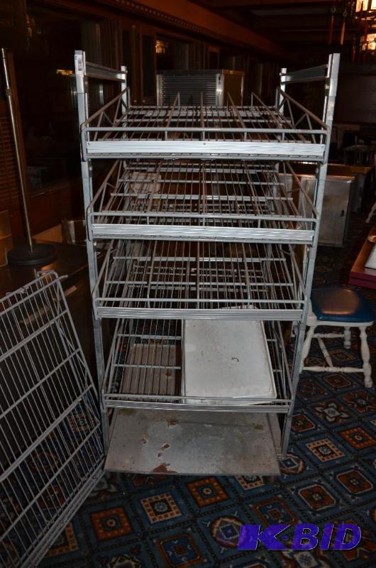 lot 247 image: 4-5 shelf Rolling can or food rack 30" x...