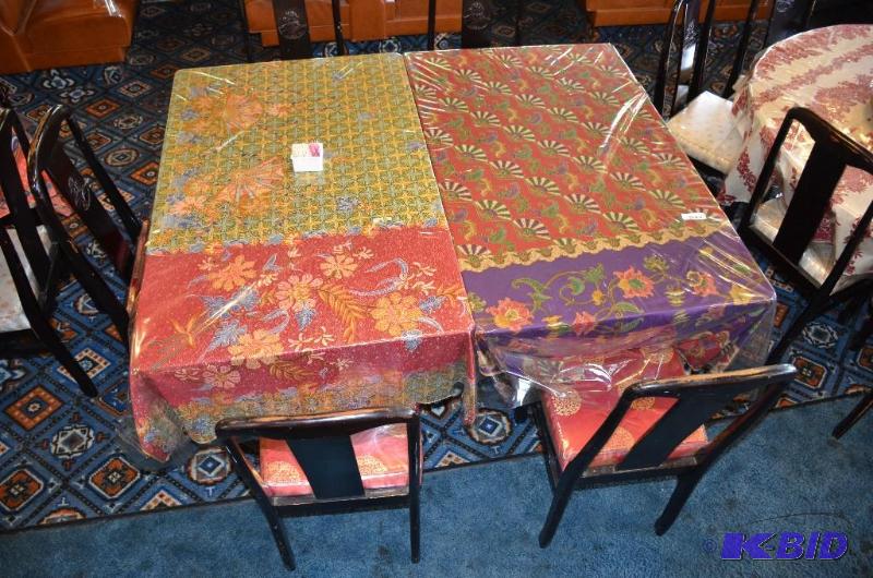 lot 71 image: 2 tables with plastic table covers and 4 chai...