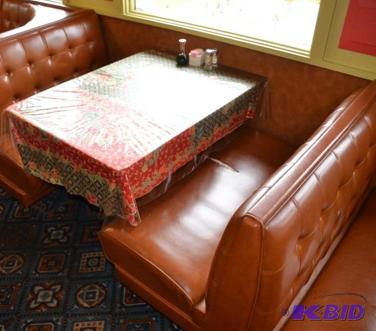 lot 78 image: Two tables and two back to back booths with p...