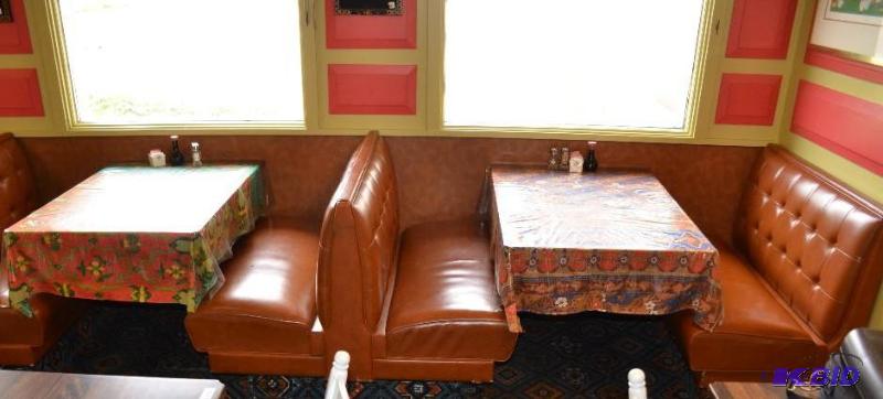 lot 79 image: Two tables and one full & one half booth ...