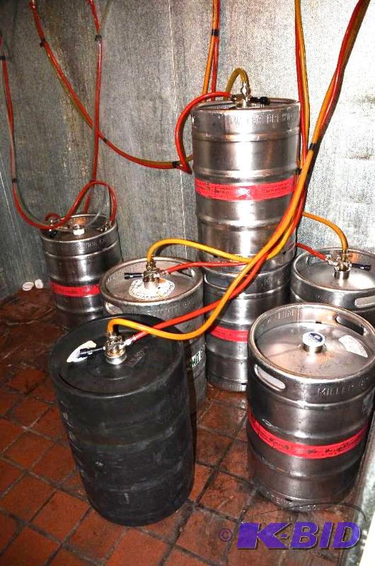 lot 85 image: 6 Beer kegs - some are MILLER beer kegs. Blac...