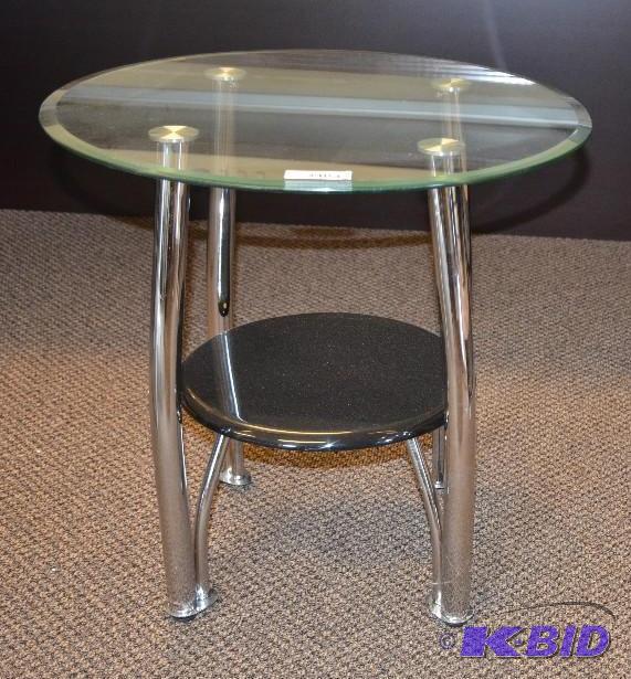 lot 103 image: Glass top round end table. 25&quotx26"...