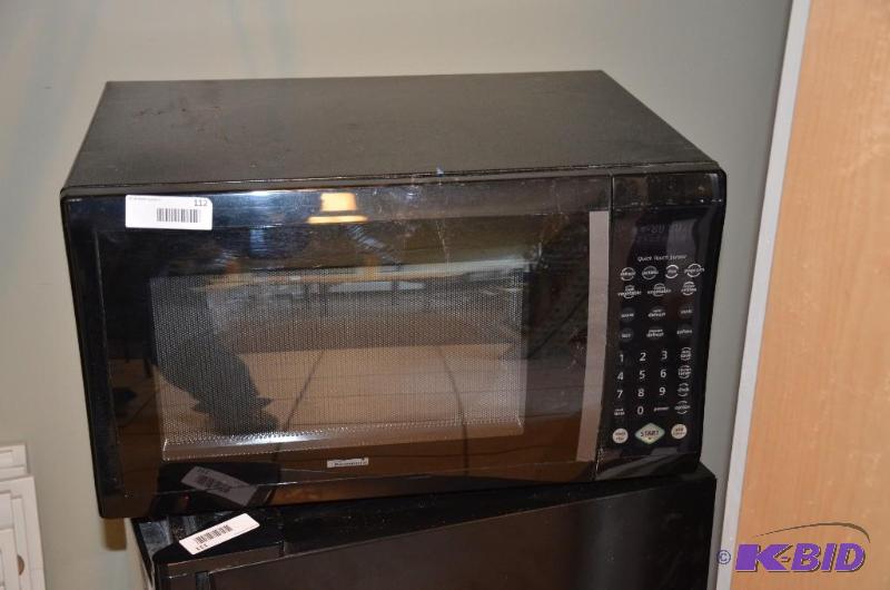 Sold at Auction: KENMORE 1000W UNDER CABINET MICROWAVE