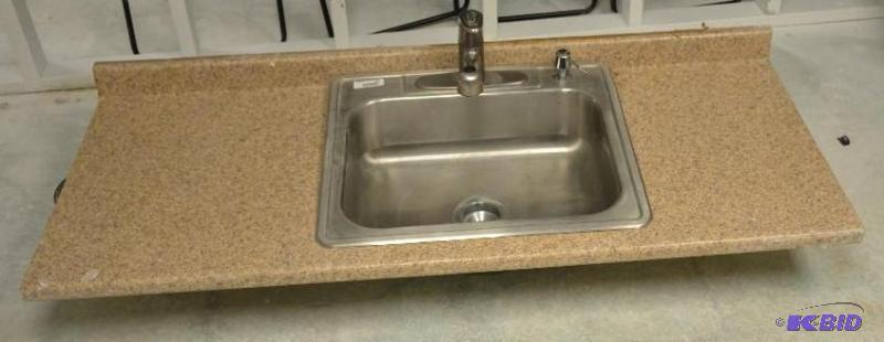lot 267 image: Stainless steel sink with faucet 25x22. Inclu...