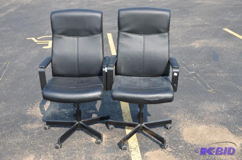 lot 64 image: 2 black leather highback rolling chairs w 100...