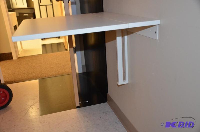 lot 83 image: Wood foldable wall desk 6x29 when down, 24x29...