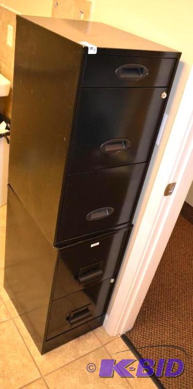 lot 93 image: 2 black filing cabinets one is sitting on top...