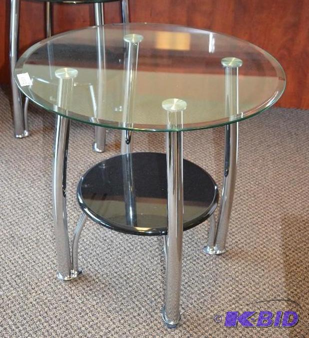 lot 99 image: Glass top round end table. 25&quotx26"...
