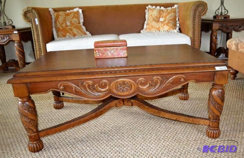 Lovely ornate carved table by Ashley Furn...