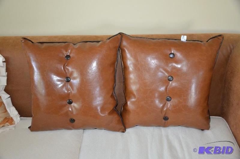 Two decorative pillows approx 16x16&quot The...