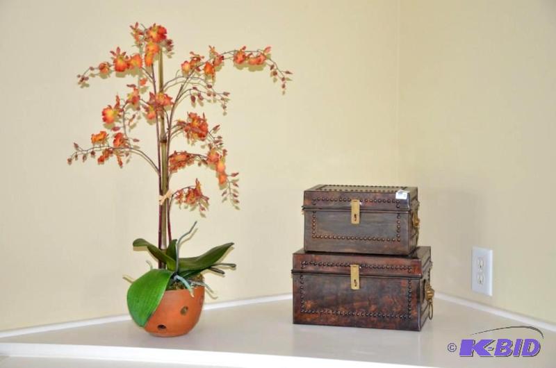 Two copper or metal boxes with brass lion hea...