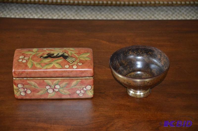 Two pieces of decorative table art. One appea...
