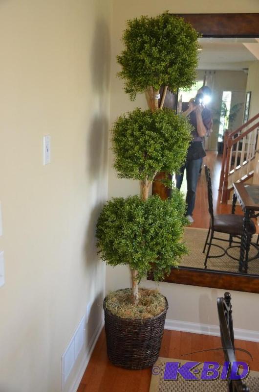 Three-tiered tree with woven basket pot. Tree...